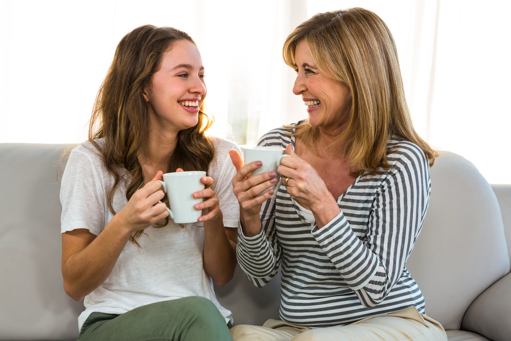 Mother,And,Daughter,Drink,Tea,At,Home