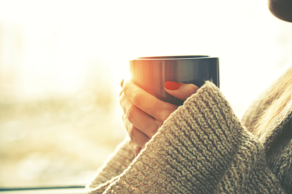 Hands,Holding,Hot,Cup,Of,Coffee,Or,Tea,In,Morning