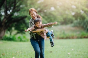 Happy,Harmonious,Family,Outdoors,Concept.mother,And,Son,Have,Activities,Together