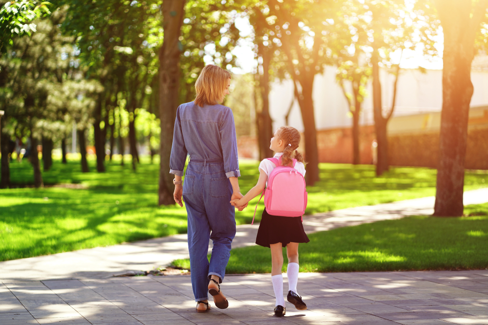 Parent,And,Pupil,Of,Primary,School,Go,Hand,In,Hand.